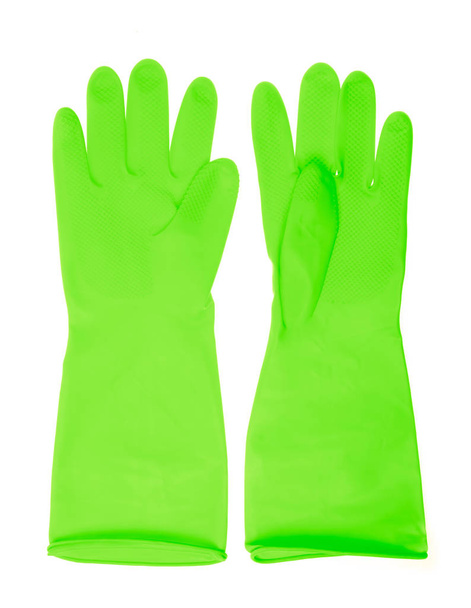 Grüne Plastikhandschuhe isoliert auf weißem Hintergrund - Foto, Bild