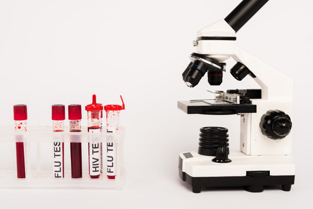 microscope and samples with lettering on white - Photo, Image