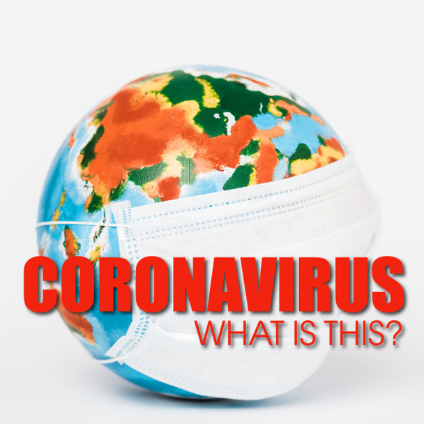 värikäs maapallo lääketieteellinen naamio lähellä coronavirus mitä tämä kirjoitus valkoinen
  - Valokuva, kuva