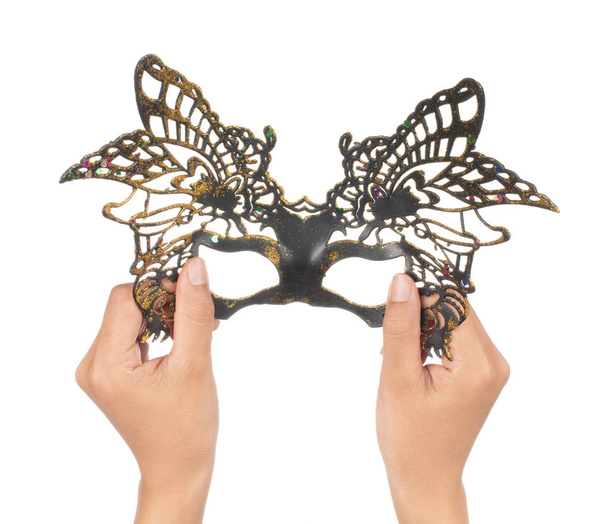 mano tenuta maschera carnevale farfalla isolato su sfondo bianco
 - Foto, immagini