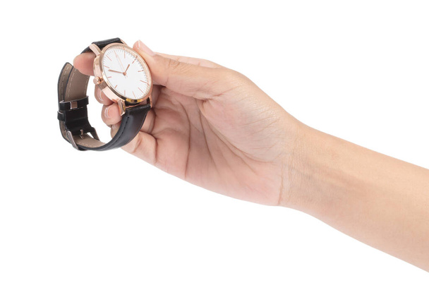 hand holding Wrist Watch isolated on white background - 写真・画像