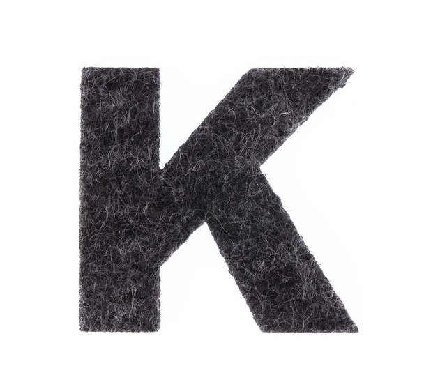 Alphabet K is made of felt isolated on white background.  - Foto, imagen