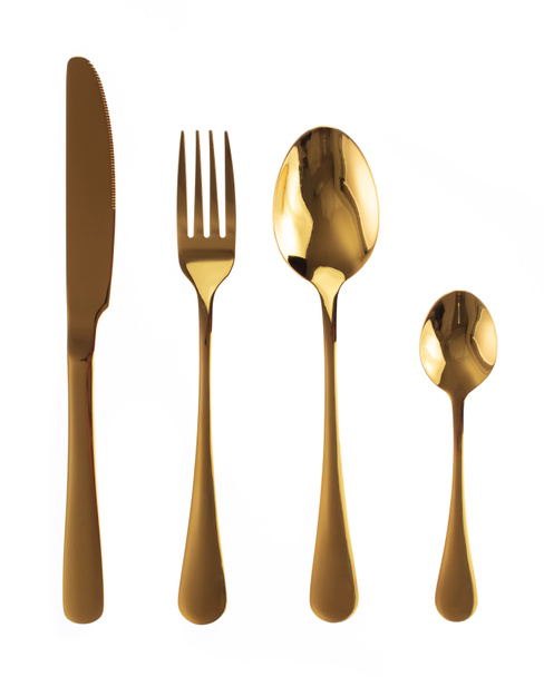 Golden Cutlery Set. Fork, Spoon and Knife isolated on white back - Foto, Imagen