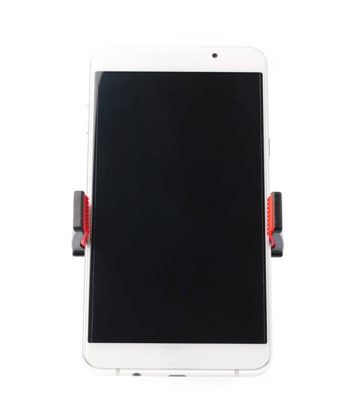 Smartphone on tripod isolated on white background. - Photo, Image