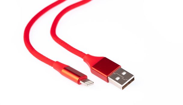 Red USB cable for smartphone isolated on white background. - Photo, Image