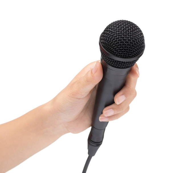 Hand houden van een microfoon interview uitvoeren van een business isolat - Foto, afbeelding