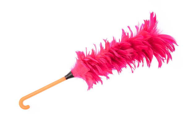 Pink duster feather broom isolated on white background. - Fotoğraf, Görsel