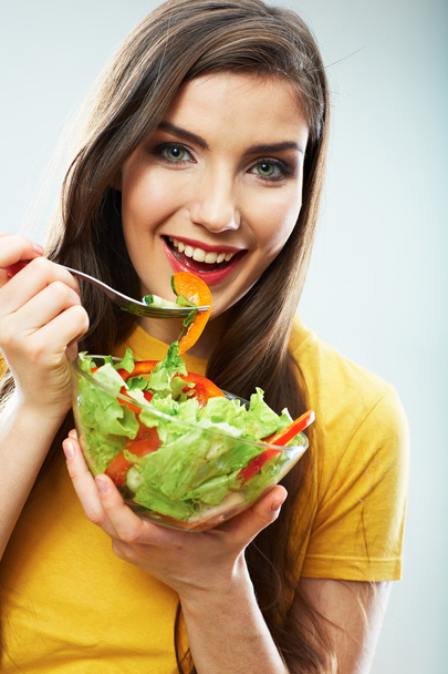 Woman eating salad - Zdjęcie, obraz