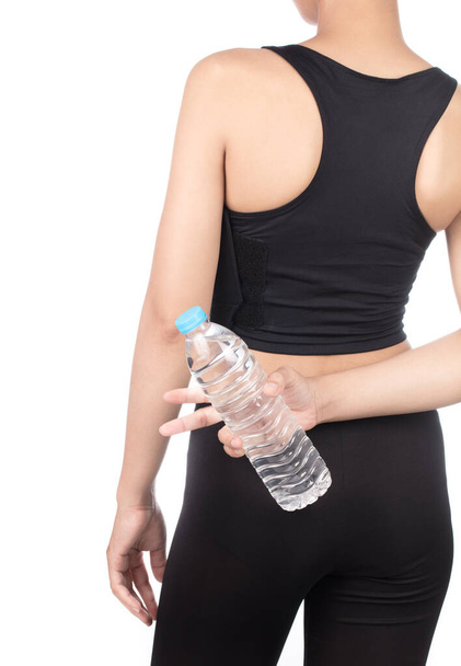back view of female holding  bottle of water isolated on white b - Foto, Bild