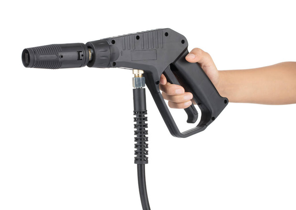 Рука тримає голову водяного пістолета високого тиску для чистої ізольованості
  - Фото, зображення