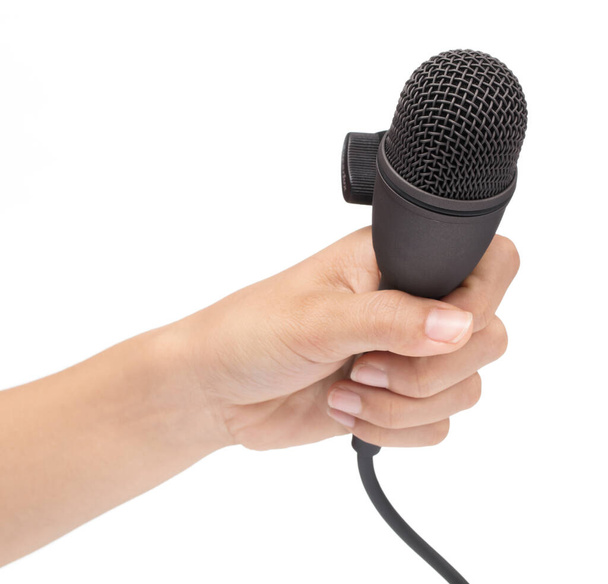 Hand holding a microphone interview conducting a business isolat - Foto, afbeelding