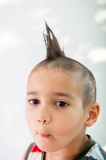 Boy with crazy hair cut - Foto, imagen