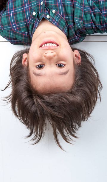 Young boy with his long hair - Photo, image