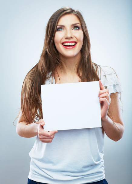 Woman holding blank paper - Zdjęcie, obraz