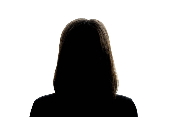 Silhouette sombre de fille sur fond blanc, le concept d'anonymat
 - Photo, image