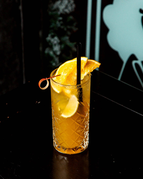 citrus juice with orange and lemon slices - Foto, Imagem
