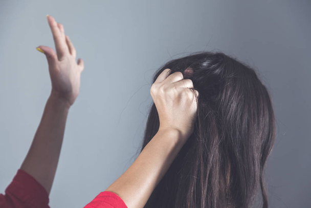 two angry woman argue hand hair - Фото, зображення