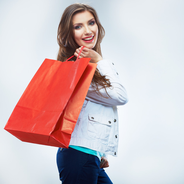 Woman holding shopping bag - Foto, imagen