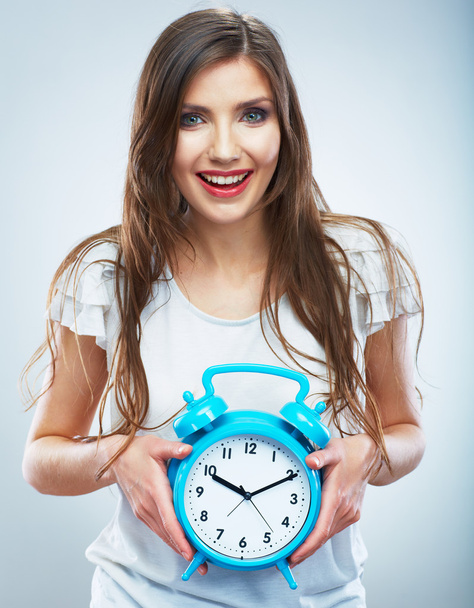 Woman holding clock - Fotografie, Obrázek
