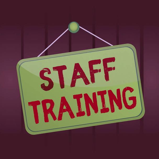 Writing note showing Staff Training. Business photo showcasing program that is designed to increase the technical skills Memo reminder empty board attached background rectangle. - Photo, Image