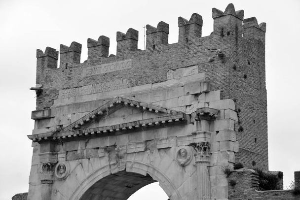 Arch of Augustus, an ancient Roman gateway to the city of Rimini in Italy - Photo, Image