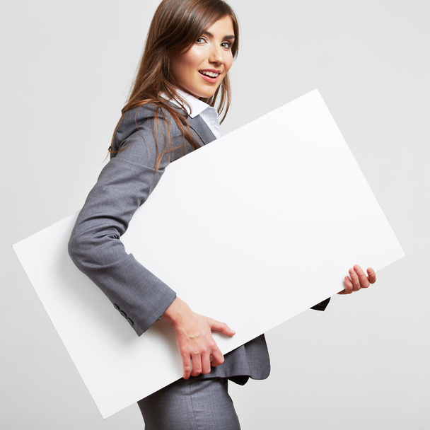 Business woman with blank board - Φωτογραφία, εικόνα