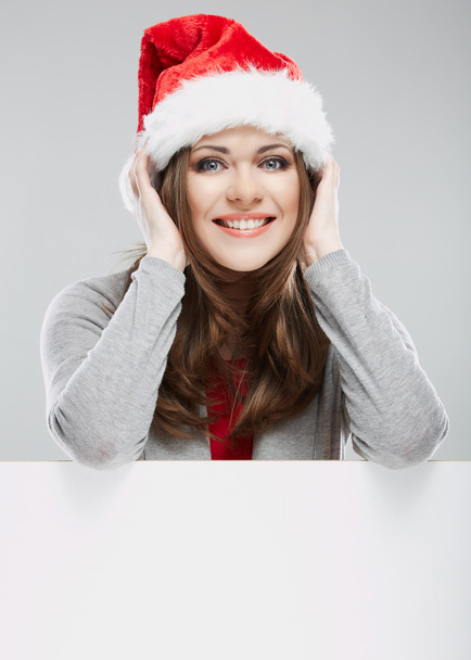 Woman in santa hat with blank banner - Foto, afbeelding