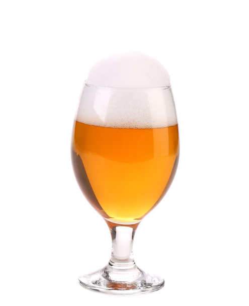 Closeup of beer glass with foam. - 写真・画像