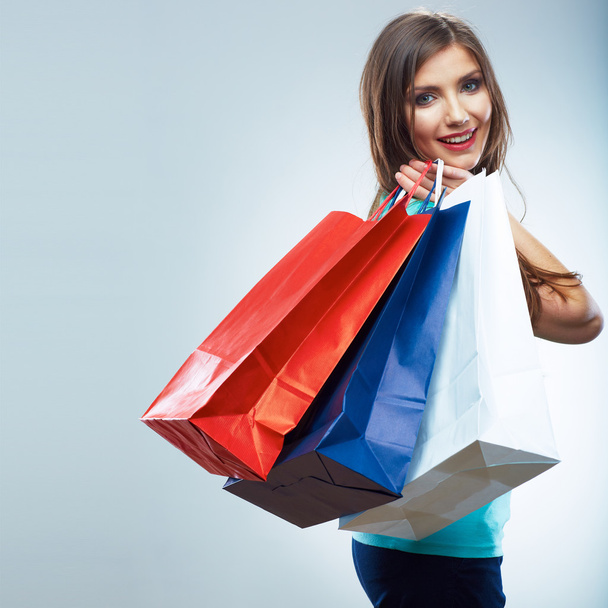 Woman holding shopping bag - Foto, afbeelding