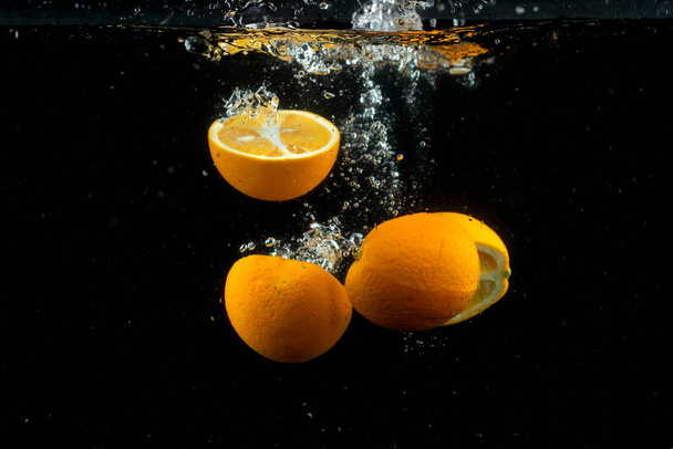 fresh lemon in the water - Photo, Image