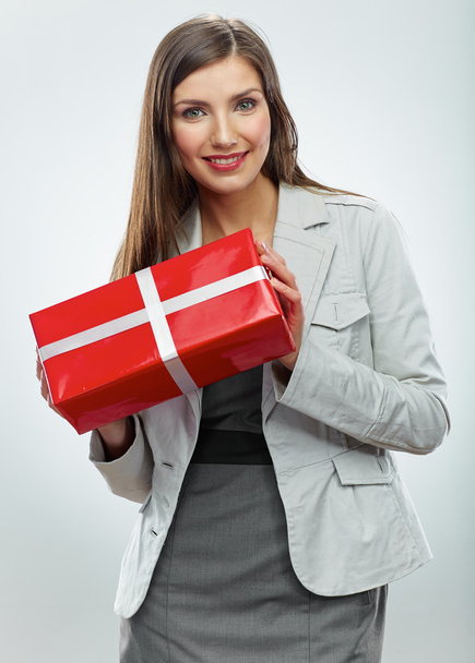 Business woman holding gift box - Photo, image