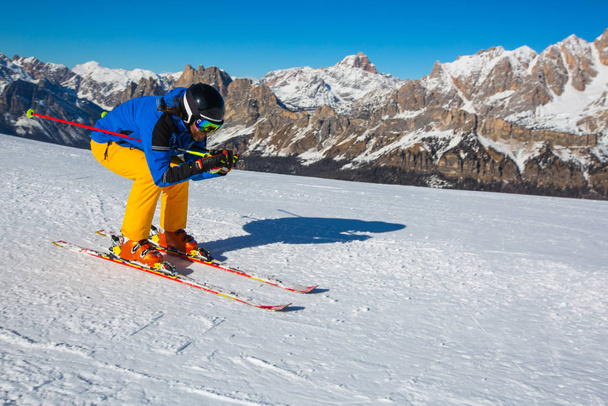 Alpine skier on slope at Cortina - Photo, Image