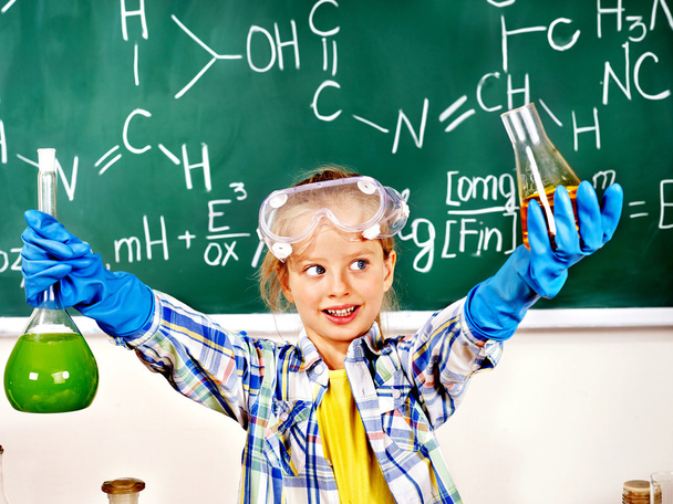 Child in chemistry class. - Fotó, kép