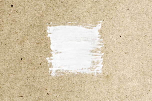 White abstract hand-painted brush stroke daub over vintage old paper - Φωτογραφία, εικόνα