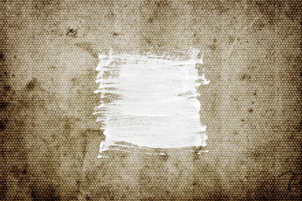 White abstract hand-painted brush stroke daub over vintage grungy stained old paper - Foto, imagen