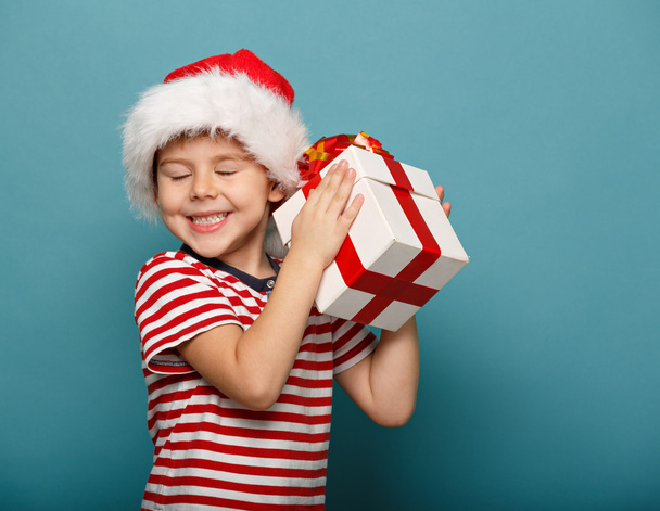 funny child in Santa red - Фото, зображення