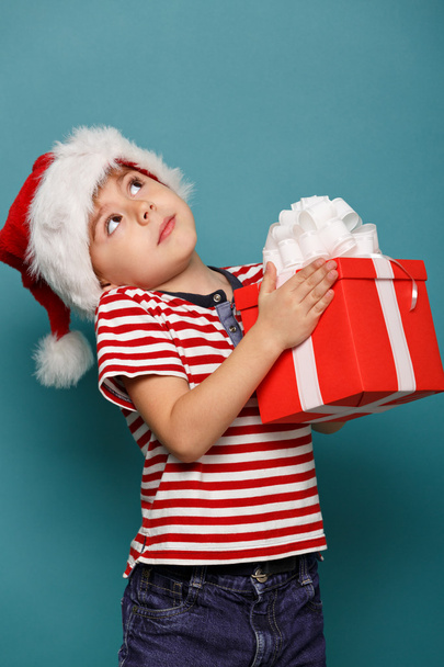 funny child in Santa red - Φωτογραφία, εικόνα