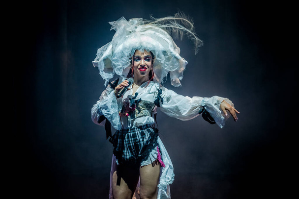 AMSTERDAM, NETHERLANDS - DECEMBER 3, 2019: FKA twigs singing while show on stage at Royal Theatre Carre. - 写真・画像