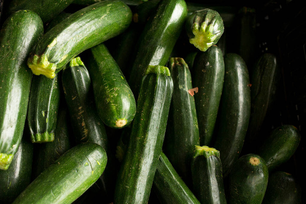 A lot of piece of green zucchini close up - Foto, Bild