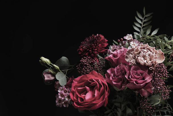Beautiful bouquet of different flowers on black background. Floral card design with dark vintage effect - Photo, image