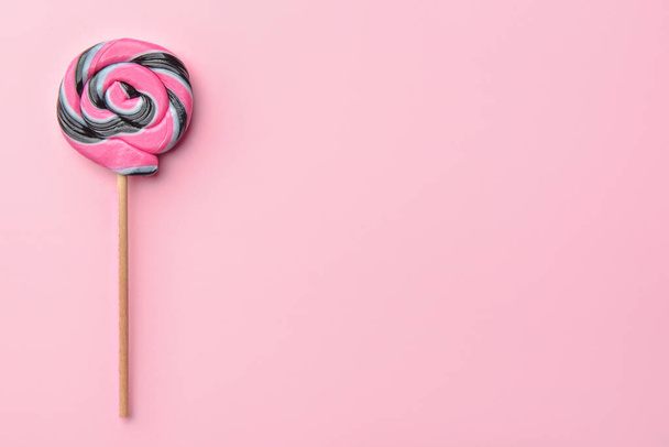 Tasty lollipop on color background - Photo, image