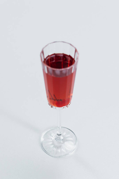 rose wine in glass isolated on gray - Photo, Image
