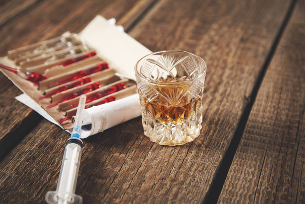 drug with syringe and whiskey  - Photo, Image