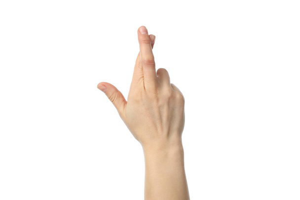 Mulher mão com dedos cruzados isolado no fundo branco
 - Foto, Imagem