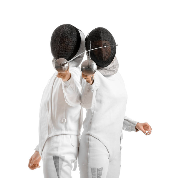 Young fencers on white background - Foto, immagini