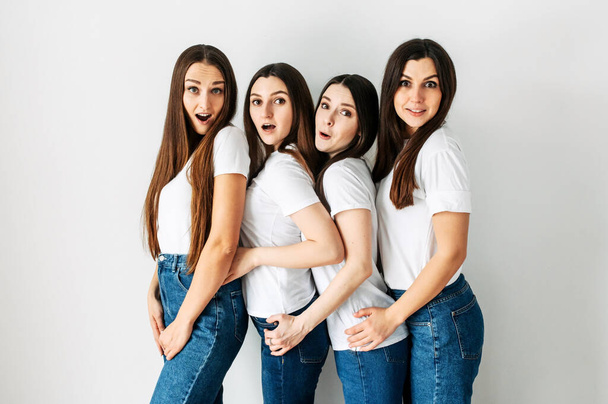 Portrait of four girls with different emotions - Foto, afbeelding