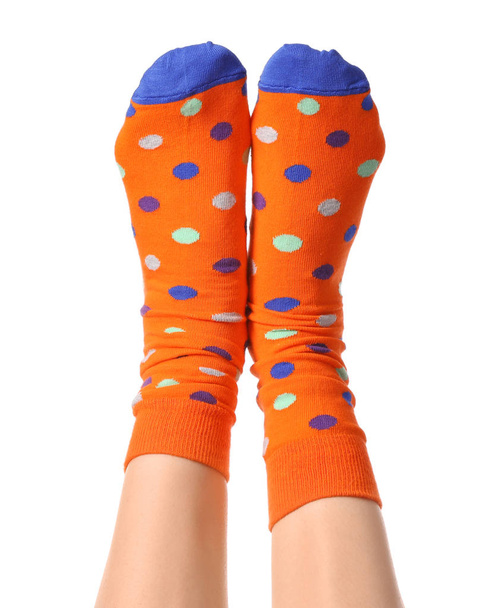 Legs of young woman in socks on white background - Photo, Image