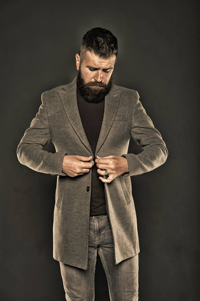 Brutal hipster man. Hipster wearing casual clothes. Hipster beard and stylish haircut. Bearded man trendy hipster style. Monochrome style outfit. Classy but modern. Fashion outfit. Masculine look - Photo, image