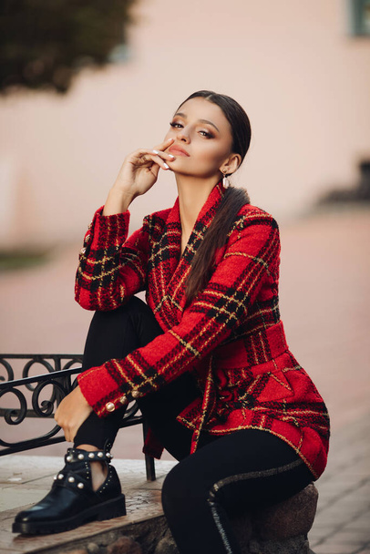 Beautiful young adult brunette in stylish look. - 写真・画像
