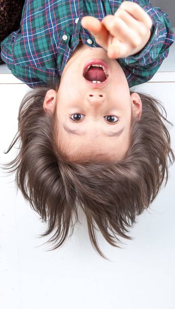 Young boy with his long hair - Valokuva, kuva